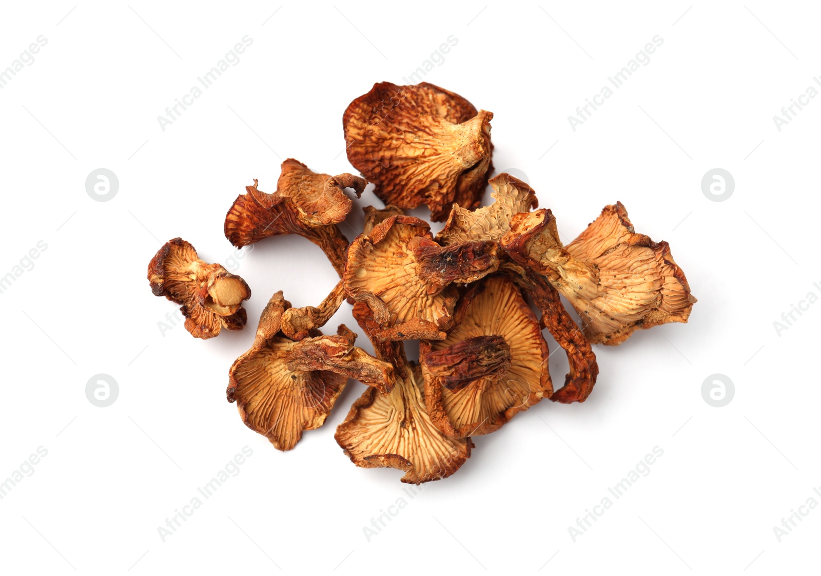 Photo of Many dried chanterelle mushrooms isolated on white, top view
