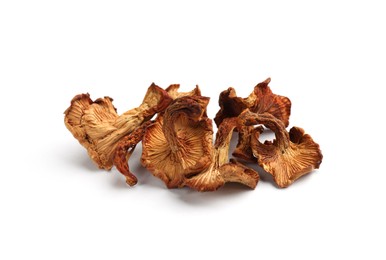 Photo of Many dried chanterelle mushrooms isolated on white