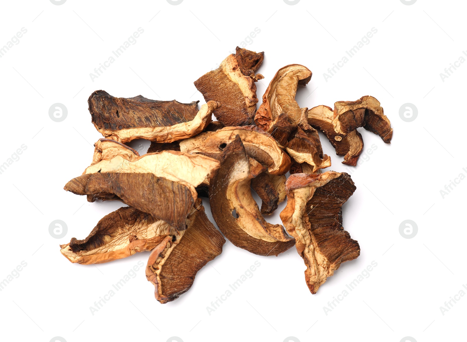 Photo of Pieces of dried mushrooms isolated on white, top view