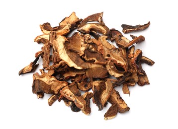 Photo of Pieces of dried mushrooms isolated on white, top view