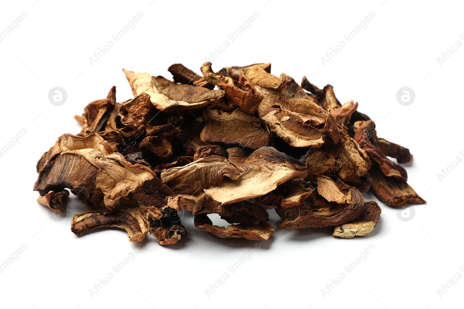 Photo of Pieces of dried mushrooms isolated on white