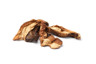 Photo of Pieces of dried mushrooms isolated on white