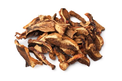 Photo of Pieces of dried mushrooms isolated on white, top view