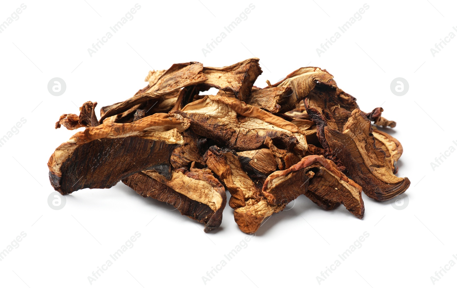 Photo of Pieces of dried mushrooms isolated on white