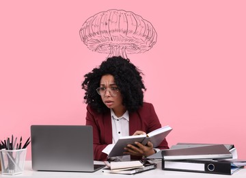 Image of Worried woman working at desk against pink background. Confused thoughts as explosion above her head. Overworked, anxiety, stress