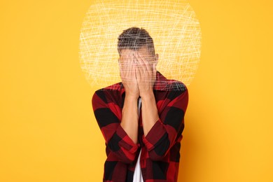 Image of Worried man covering his eyes on orange background. Confused thoughts as messy lines around his head. Stress, anxiety, depression