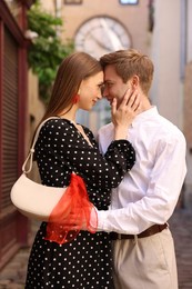 Photo of Lovely couple walking together on city street