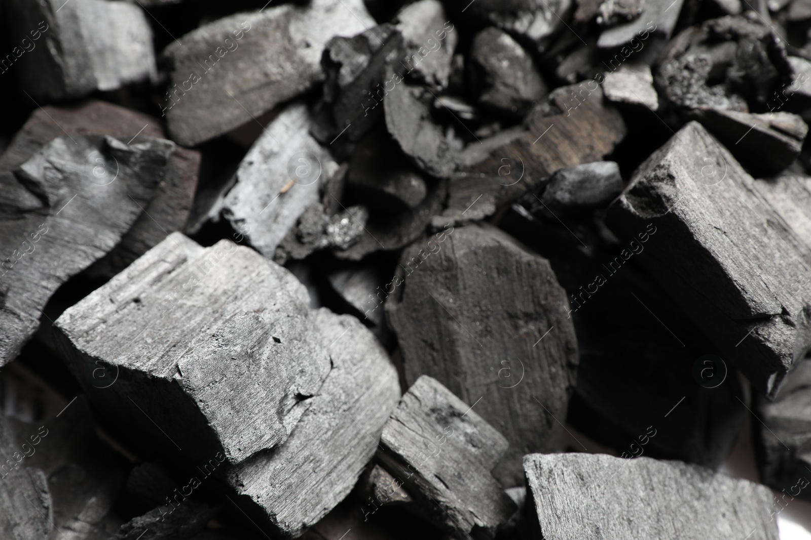 Pieces of black coals as background, closeup Photo of Pieces of black coals as background, closeup