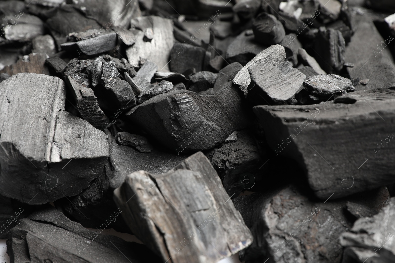 Pieces of black coals as background, closeup Photo of Pieces of black coals as background, closeup