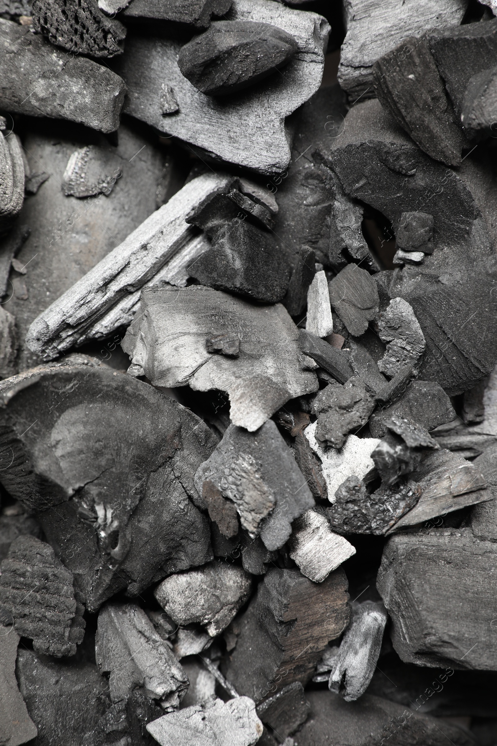Pieces of black coals as background, top view Photo of Pieces of black coals as background, top view