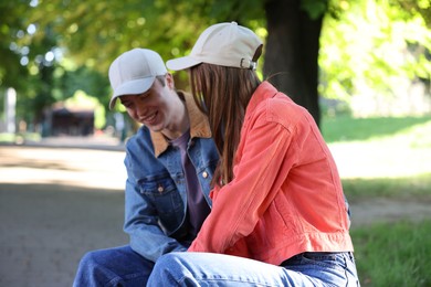 Photo of Lovely couple spending time together in park