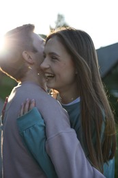 Photo of Lovely couple walking together in park on sunny day