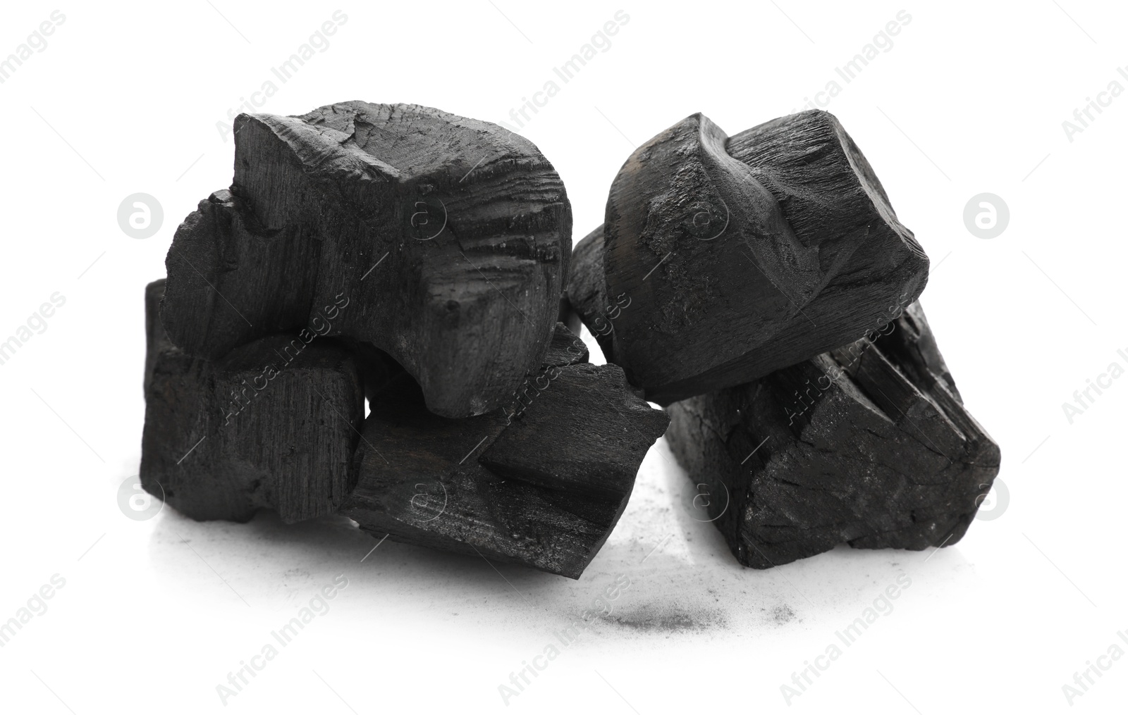 Pieces of black coals isolated on white Photo of Pieces of black coals isolated on white