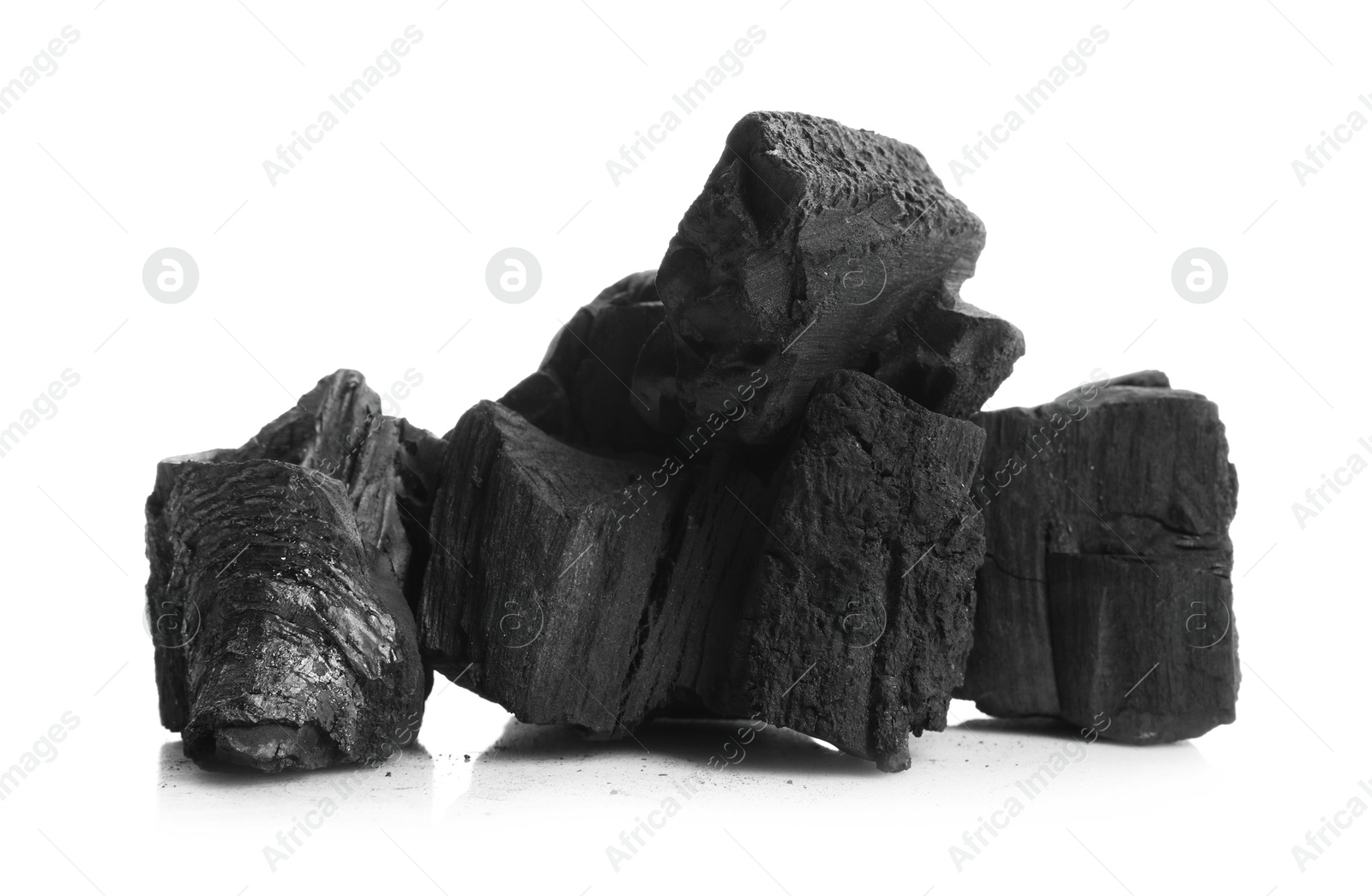 Pieces of black coals isolated on white Photo of Pieces of black coals isolated on white