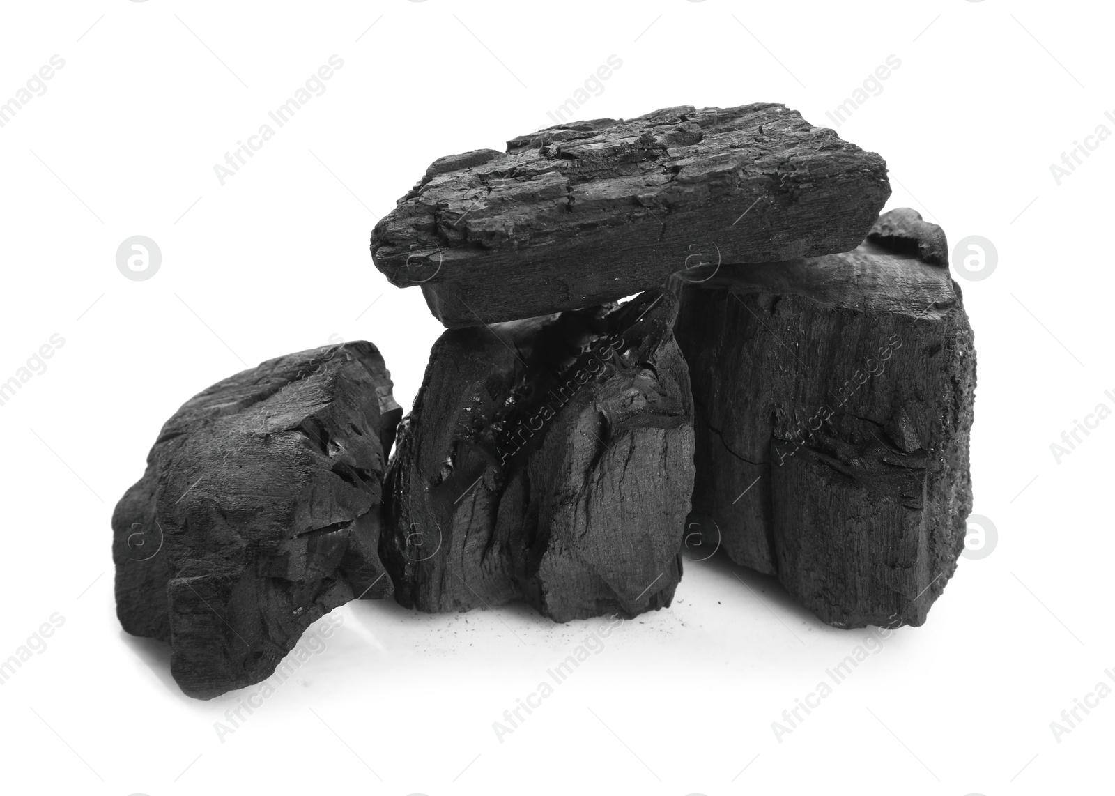 Pieces of black coals isolated on white Photo of Pieces of black coals isolated on white