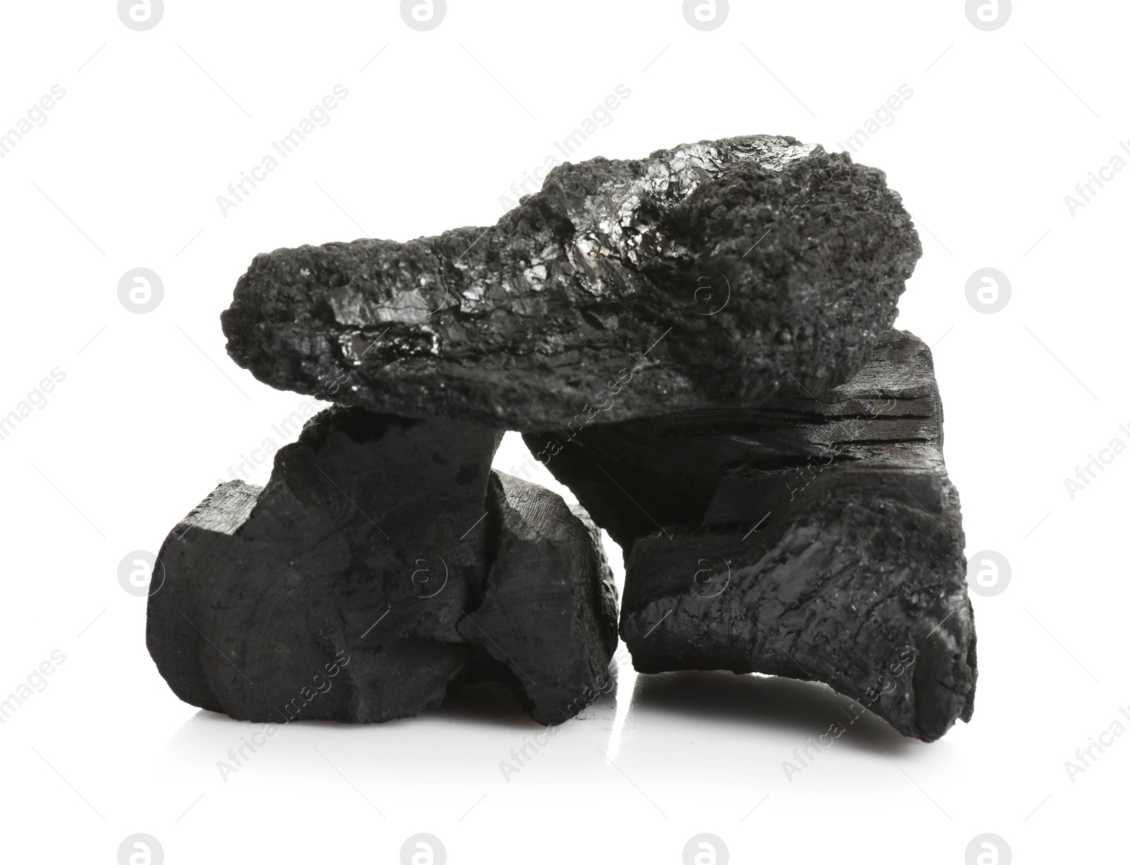 Pieces of black coals isolated on white Photo of Pieces of black coals isolated on white