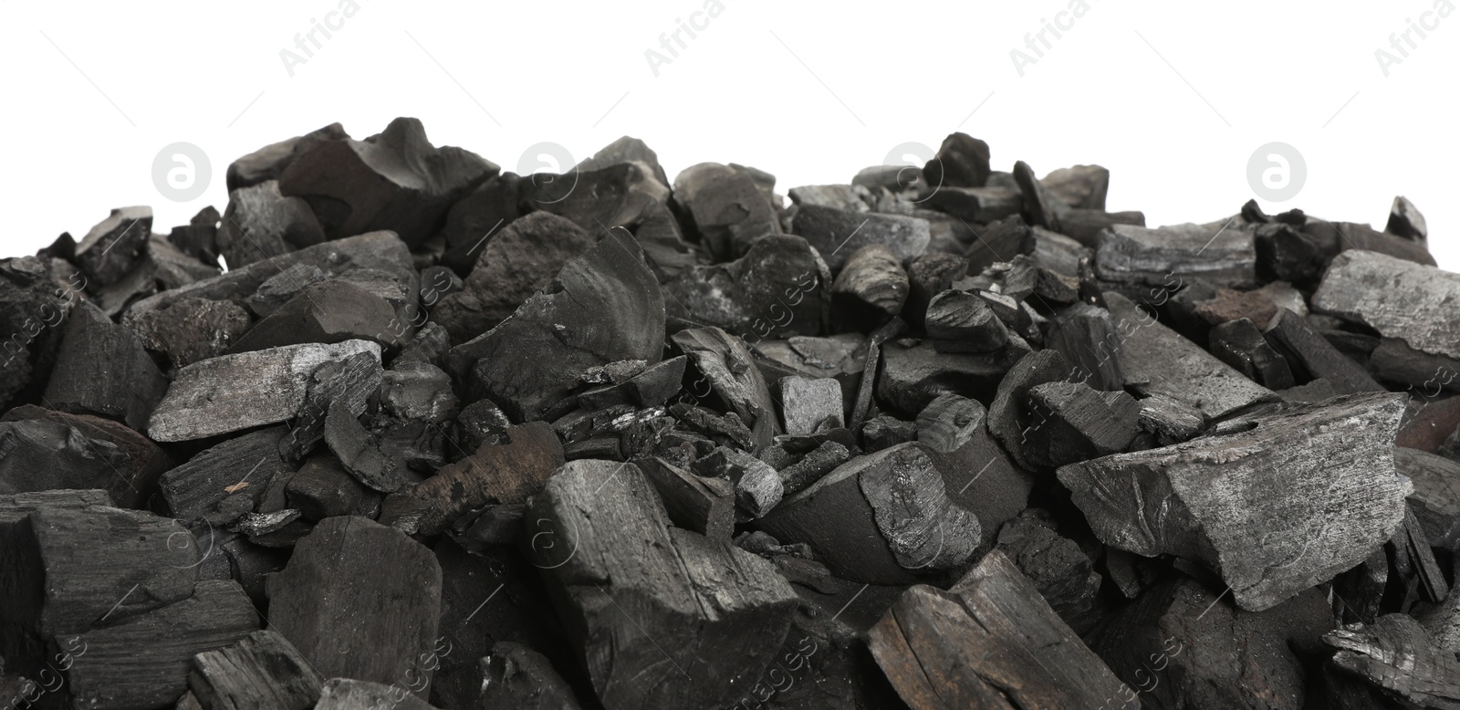 Pieces of black coals isolated on white Photo of Pieces of black coals isolated on white