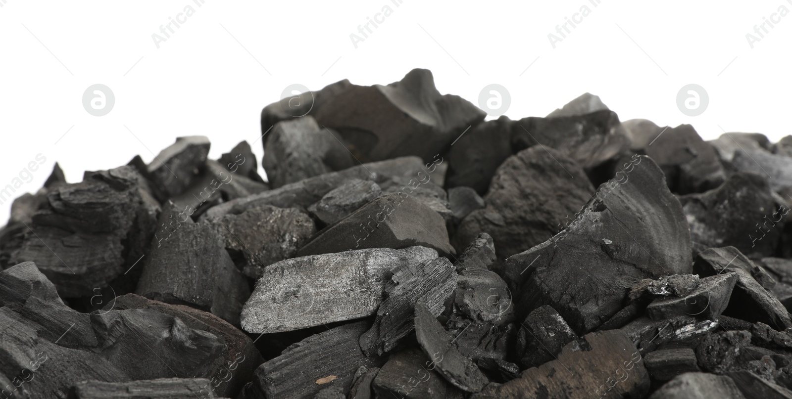 Pieces of black coals isolated on white Photo of Pieces of black coals isolated on white