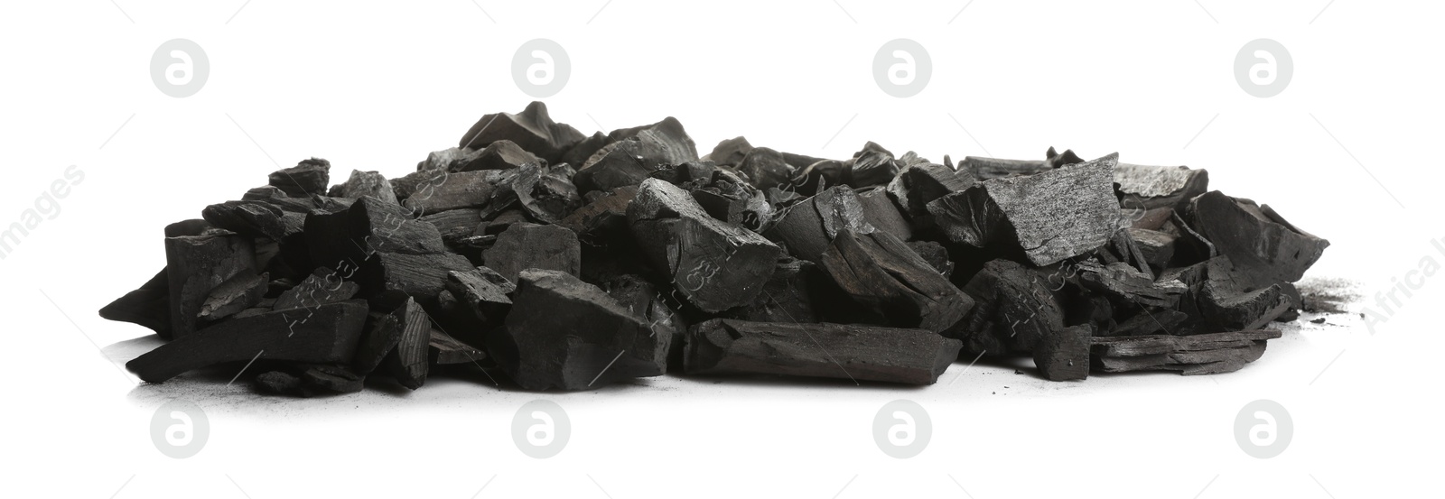 Pieces of black coals isolated on white Photo of Pieces of black coals isolated on white
