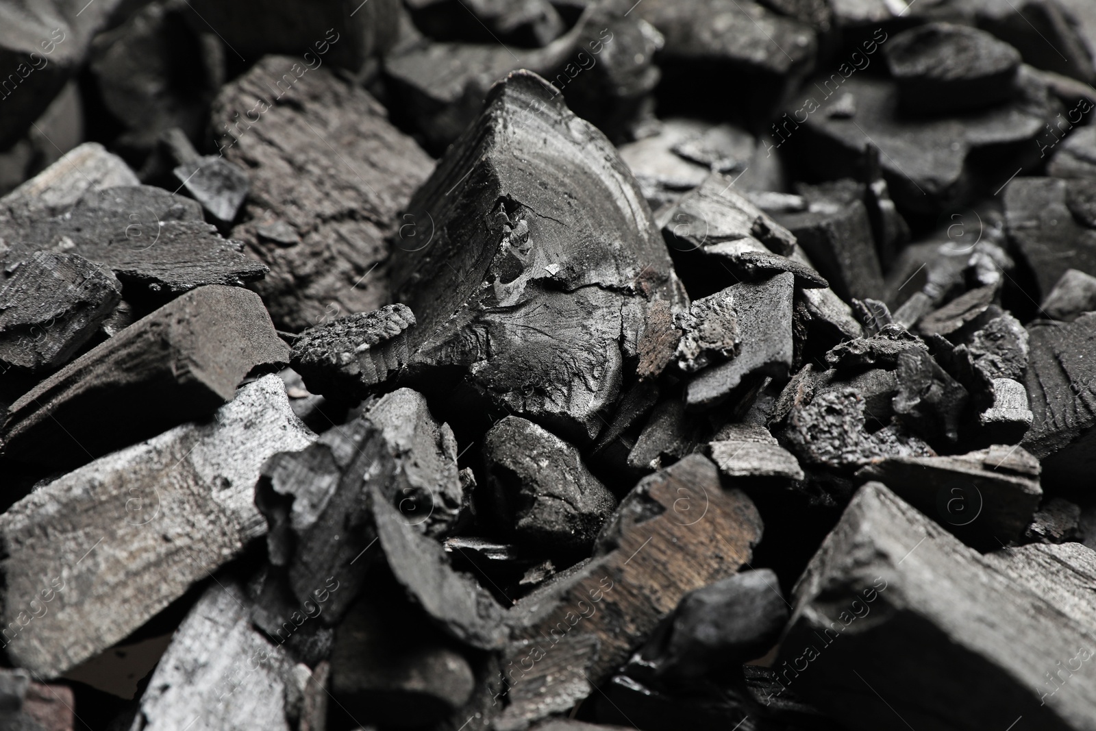 Pieces of black coals as background, closeup Photo of Pieces of black coals as background, closeup