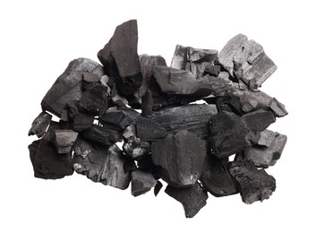 Photo of Pieces of black coals isolated on white, top view