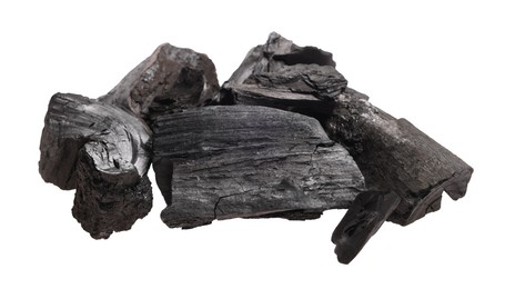 Photo of Pieces of black coals isolated on white
