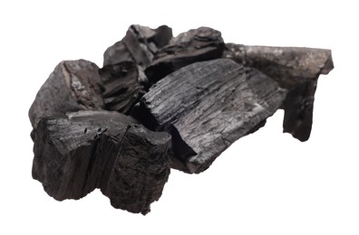 Photo of Pieces of black coals isolated on white