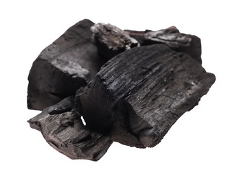 Photo of Pieces of black coals isolated on white