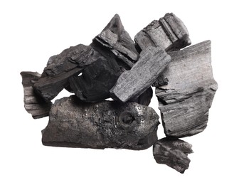 Photo of Pieces of black coals isolated on white, top view
