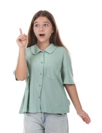 Photo of Teenage girl pointing at something on white background