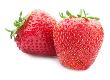 Photo of Fresh strawberries isolated on white. Seasonal berries