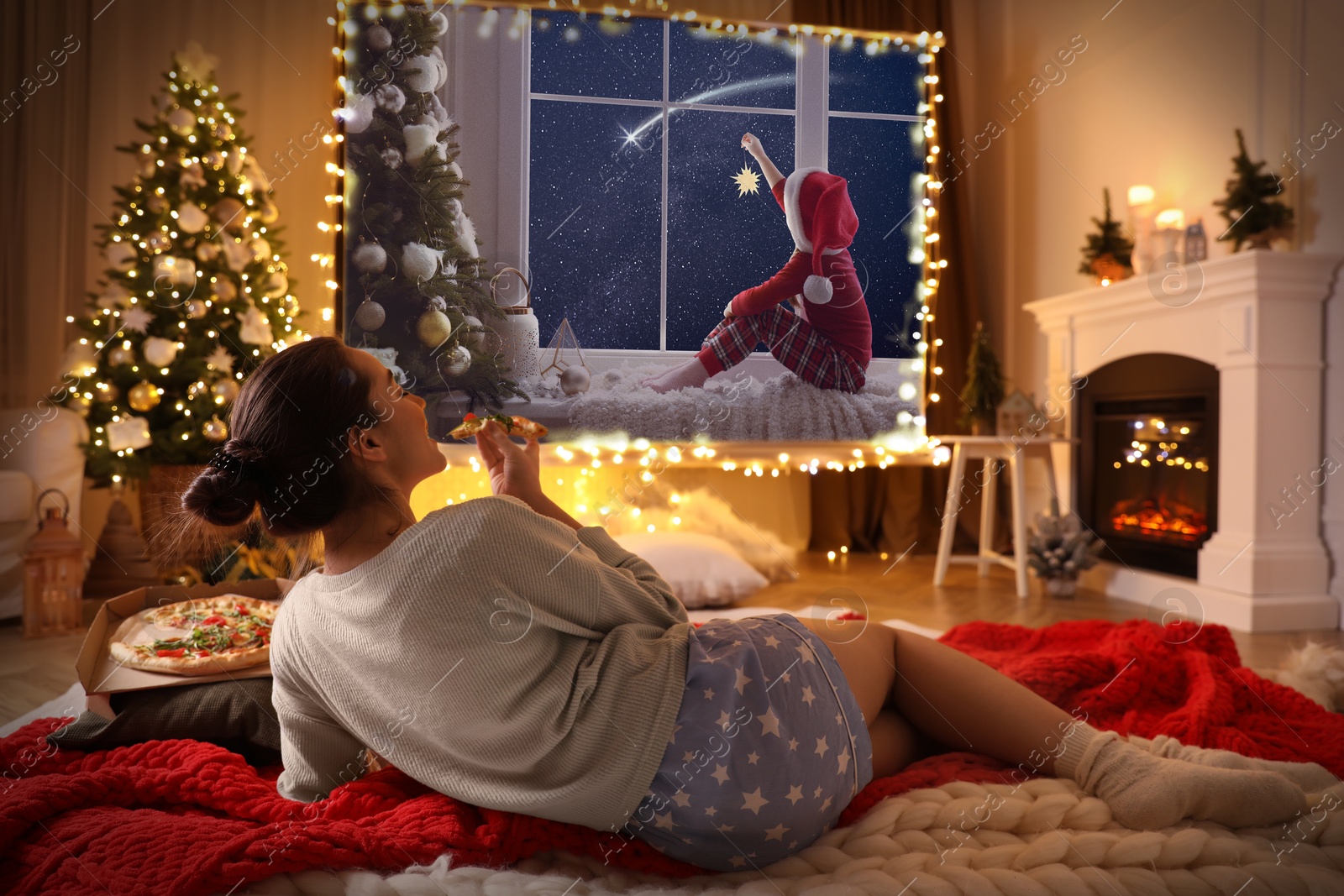 Woman eating pizza and watching Christmas movie using video projector at home Image of Woman eating pizza and watching Christmas movie using video projector at home