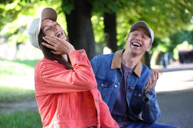 Photo of Lovely couple spending time together in park