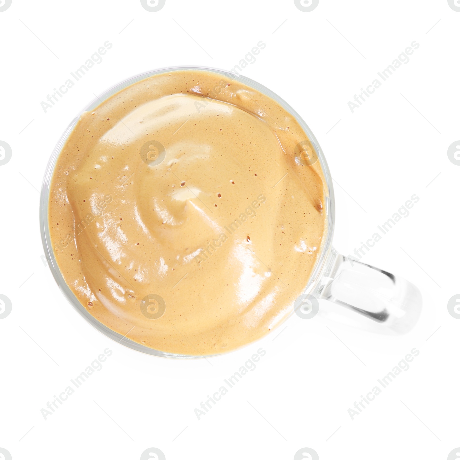 Photo of Delicious dalgona coffee in glass cup isolated on white, top view
