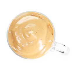 Photo of Delicious dalgona coffee in glass cup isolated on white, top view