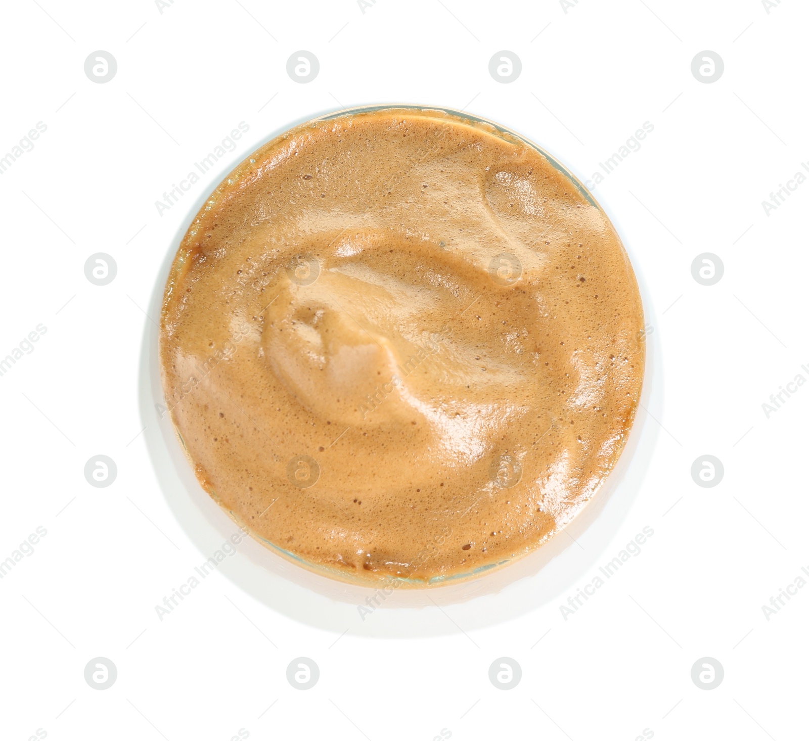 Photo of Delicious dalgona coffee in glass isolated on white, top view