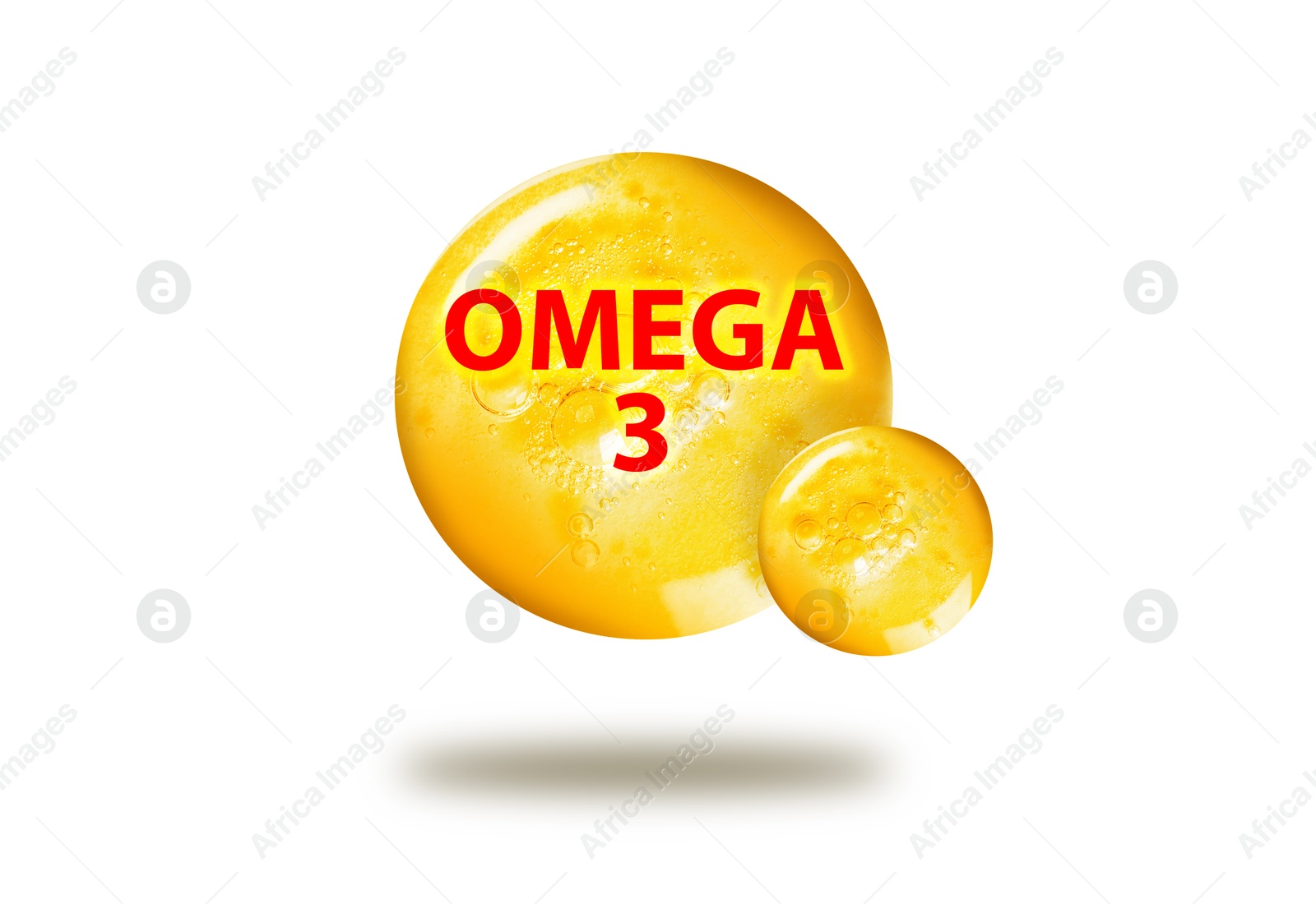 Image of Yellow drops of Omega-3 in air on white background