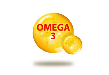 Image of Yellow drops of Omega-3 in air on white background
