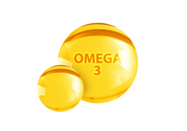 Image of Yellow drops of Omega-3 on white background