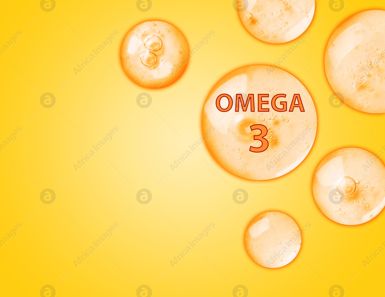Drops of Omega-3 on yellow gradient background, space for text Image of Drops of Omega-3 on yellow gradient background, space for text