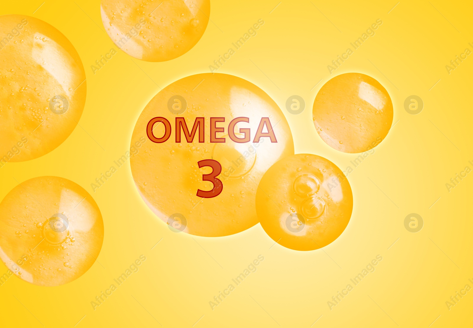 Drops of Omega-3 on yellow gradient background Image of Drops of Omega-3 on yellow gradient background