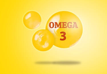 Image of Drops of Omega-3 in air on yellow gradient background
