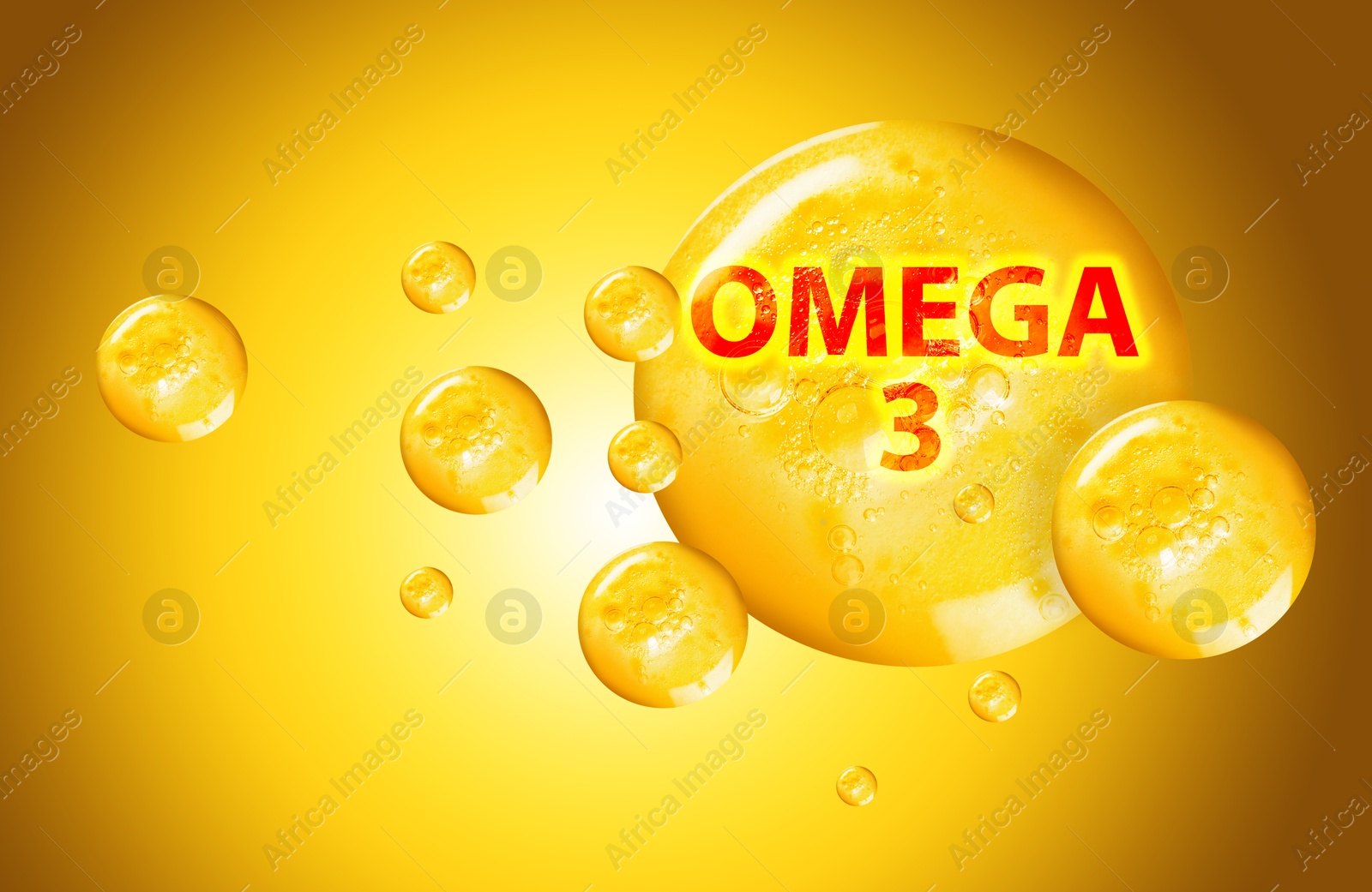 Drops of Omega-3 on yellow gradient background Image of Drops of Omega-3 on yellow gradient background