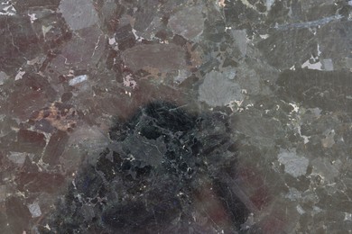 Photo of Texture of stone surface as background, top view