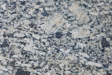 Photo of Texture of stone surface as background, top view