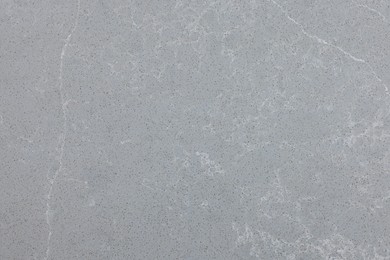 Photo of Texture of grey marble surface as background, top view