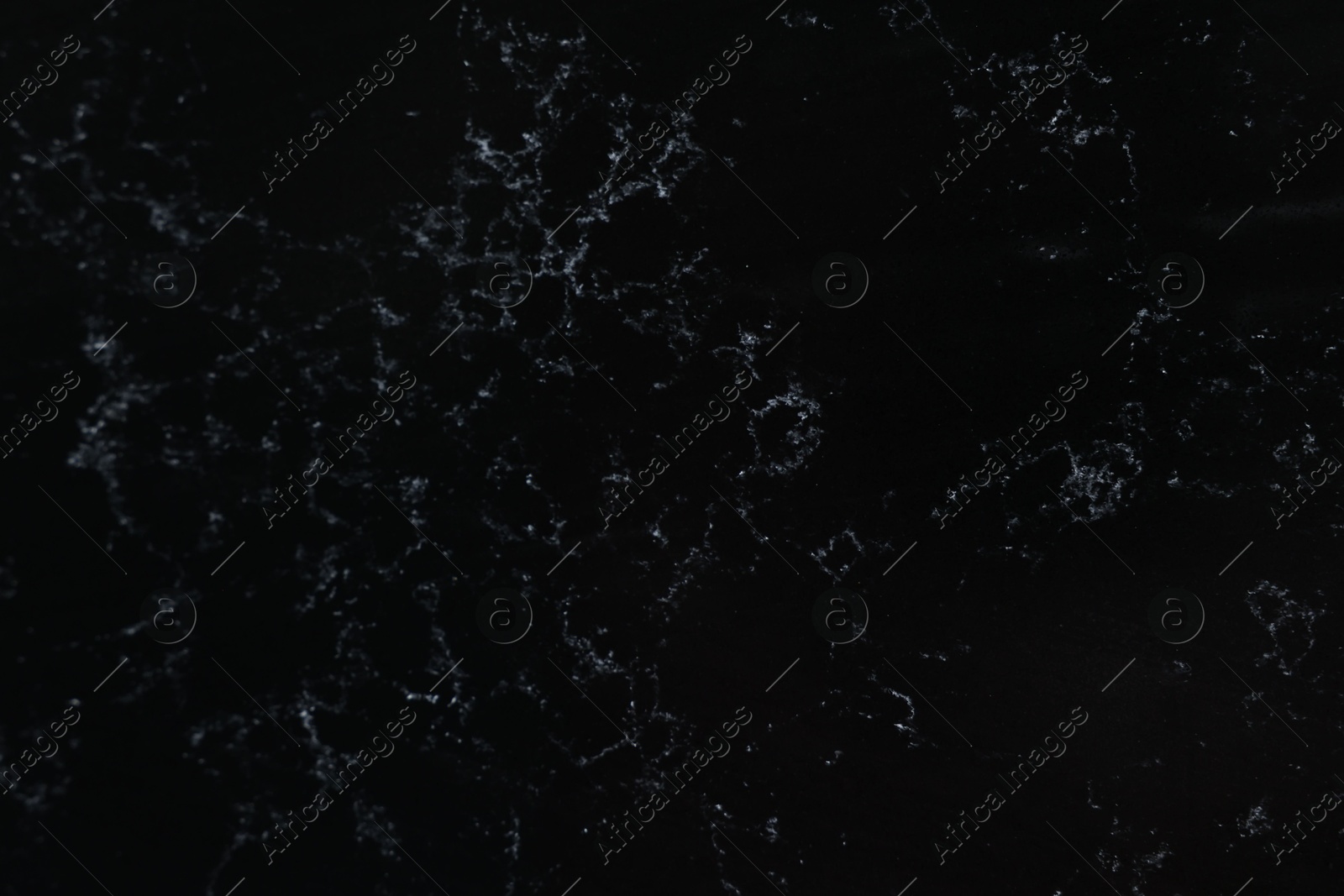 Photo of Texture of black marble surface as background, top view