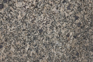 Photo of Texture of stone surface as background, top view