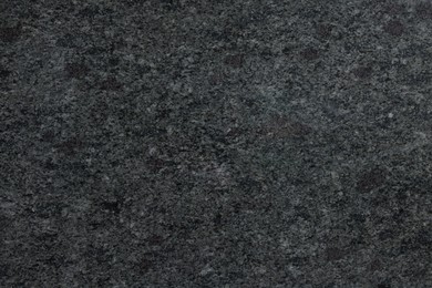 Photo of Texture of stone surface as background, top view