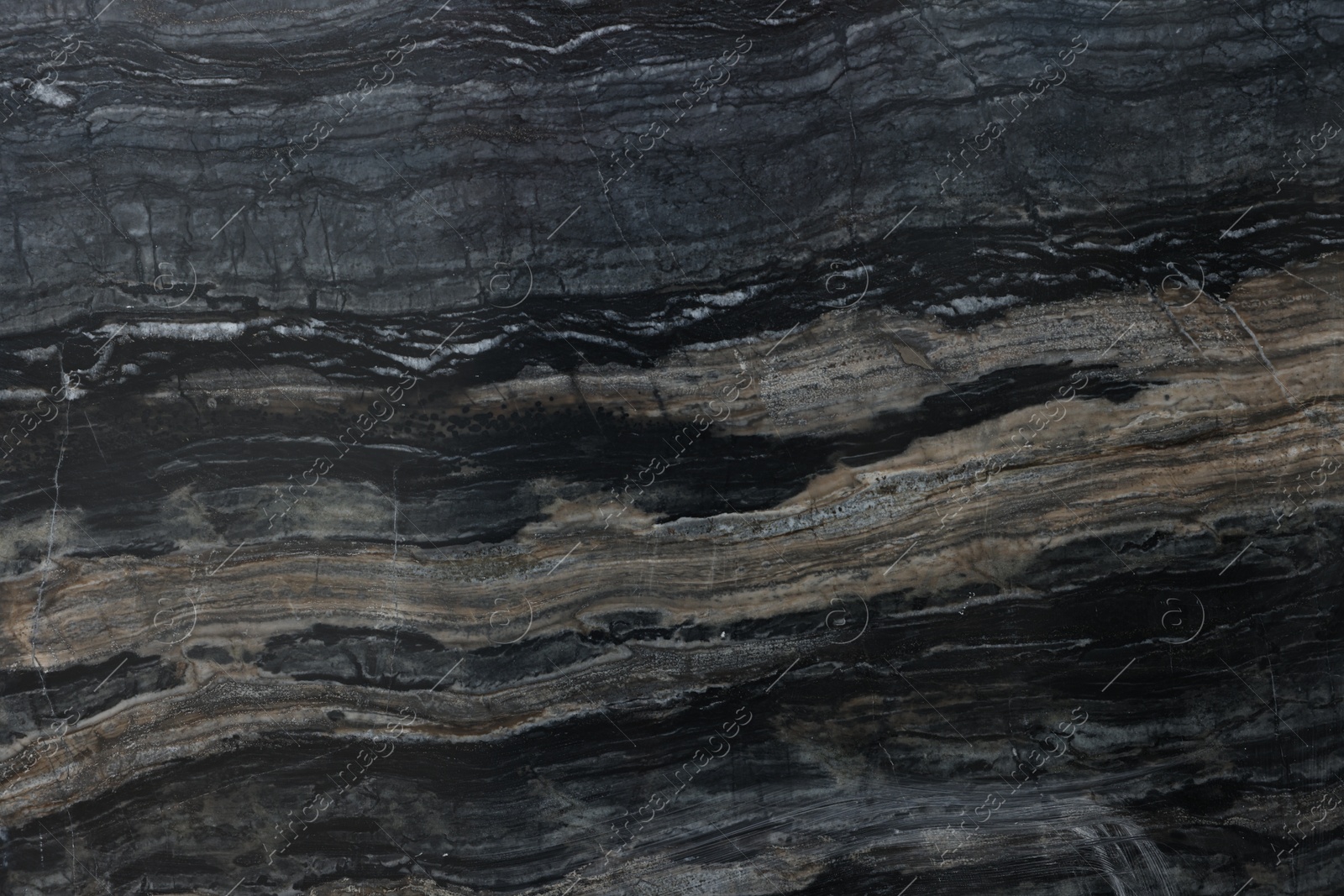 Photo of Texture of dark marble surface as background, top view